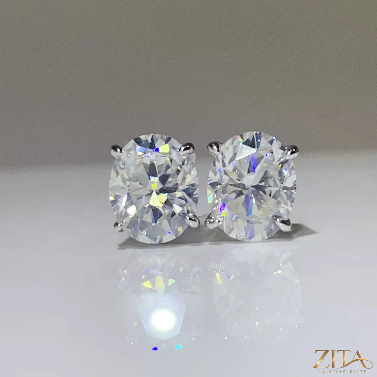 Sterling silver moissanite earrings with 10 carats of sparkling stones, showcasing elegant dangle design.