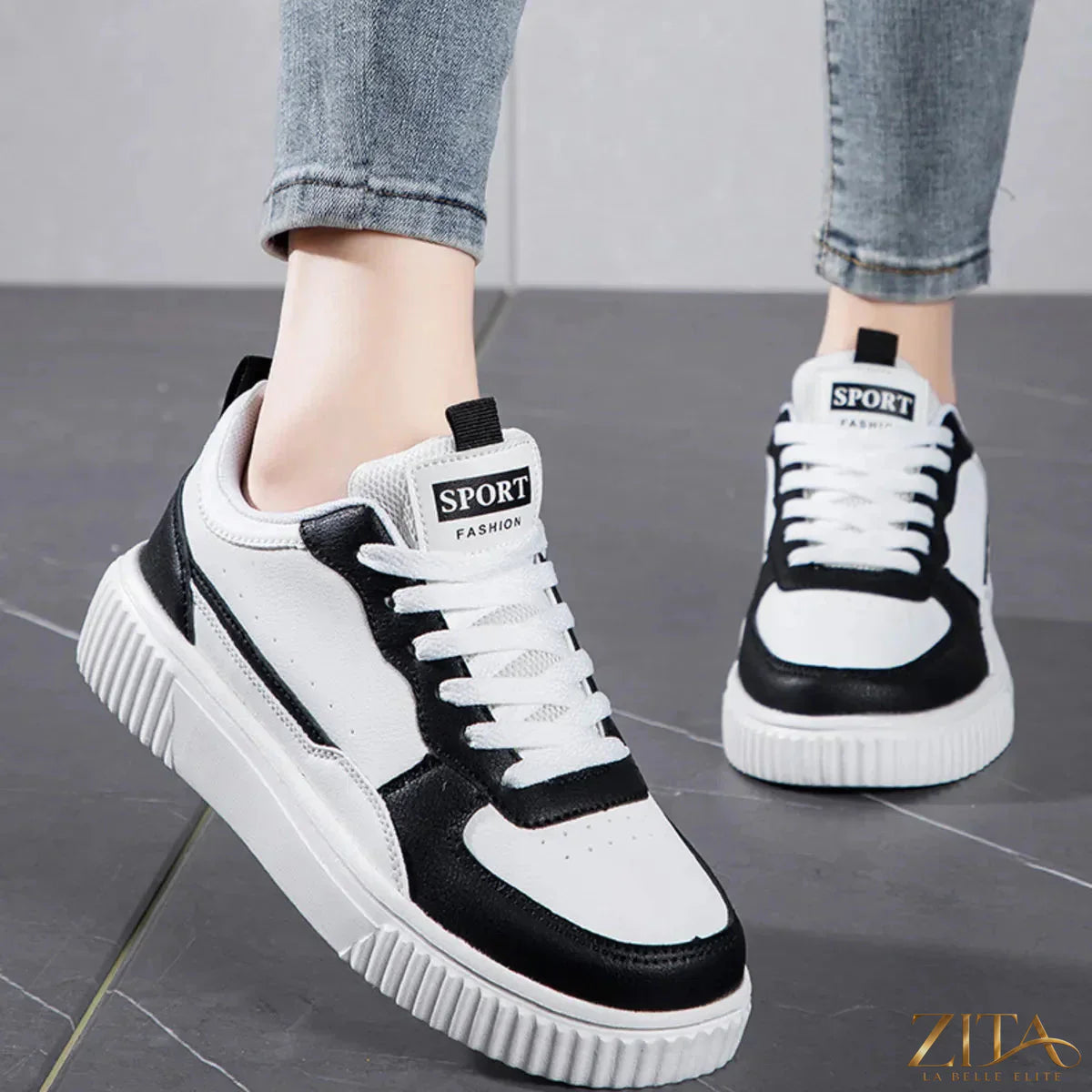 Zita La Belle Elite lace-up contrast platform sneakers featuring black and white design with chunky soles.