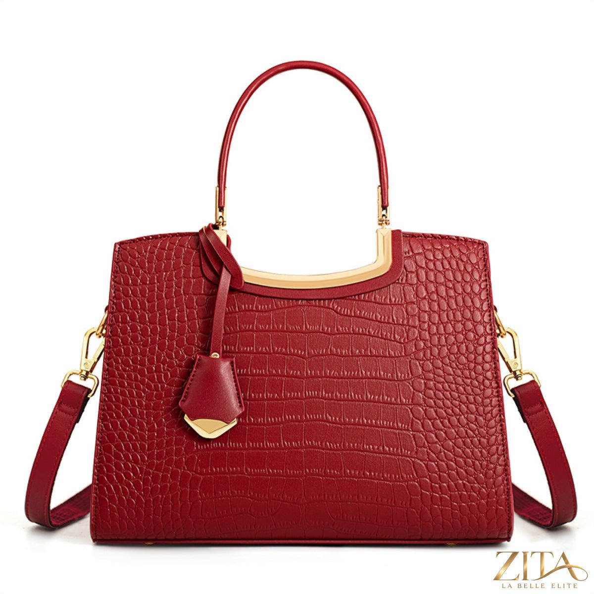 Zita La Belle Elite crocodile embossed leather top handle handbag with structured design and gold-tone hardware.