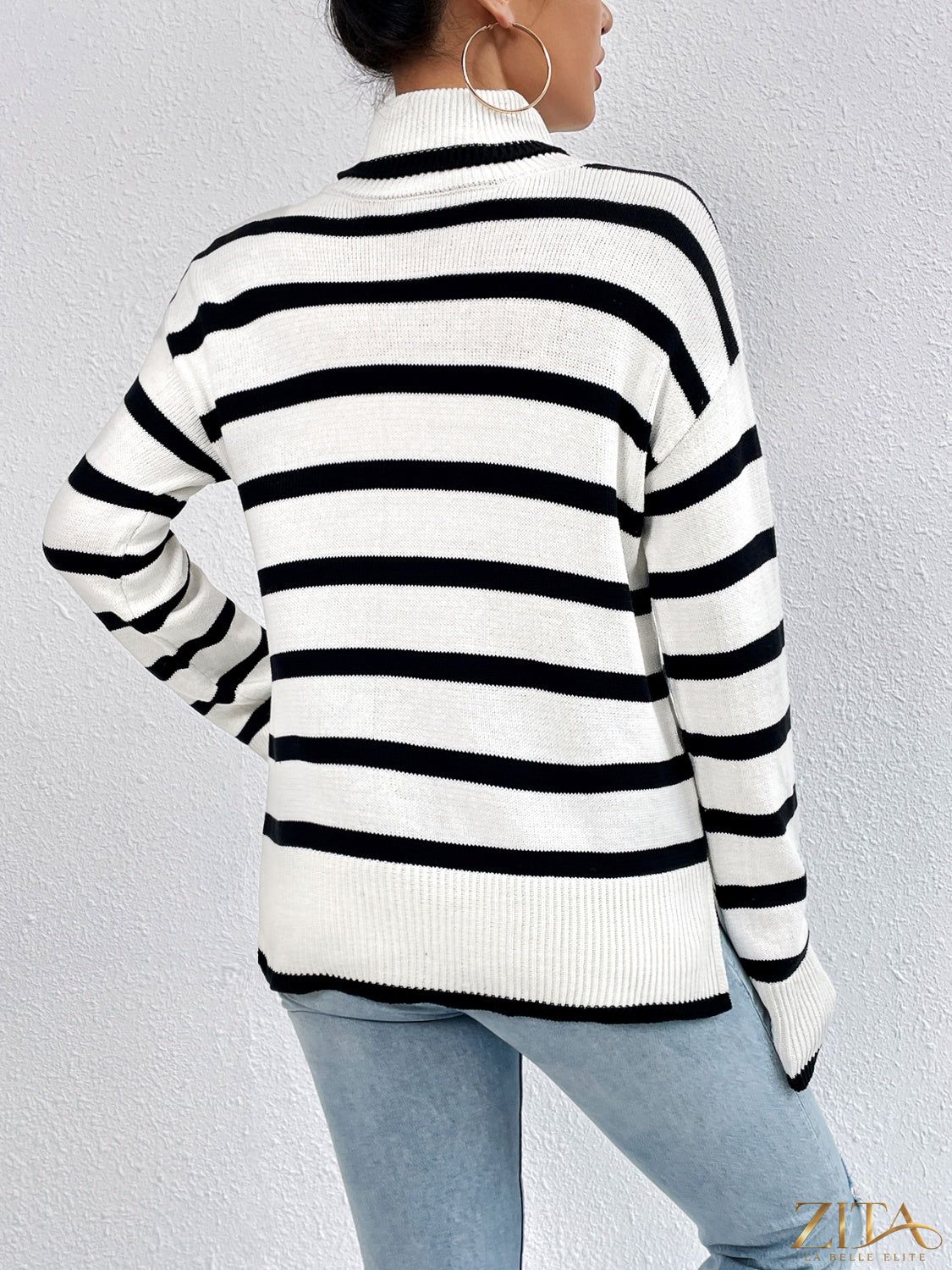 Striped turtleneck drop shoulder sweater by Trendsi, featuring cozy knit fabric and stylish design in a close-up shot
