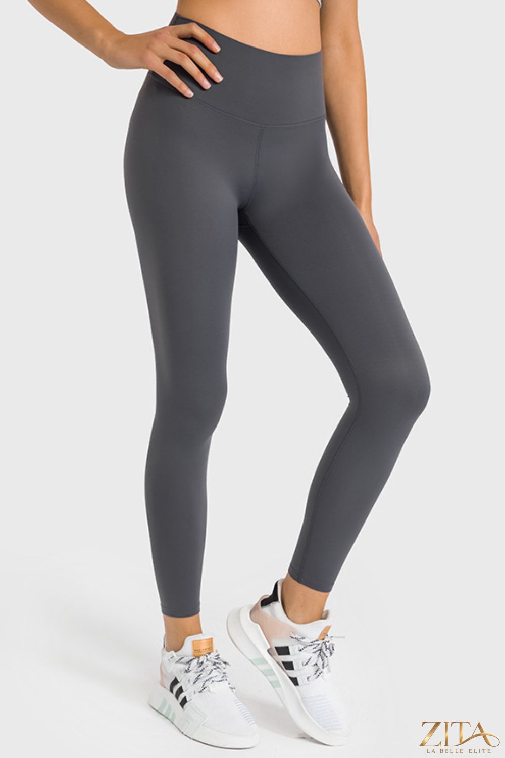 Zita La Belle Elite Millennia high waist ankle-length yoga leggings shown on a model, featuring a sleek fit and comfortable stretch.
