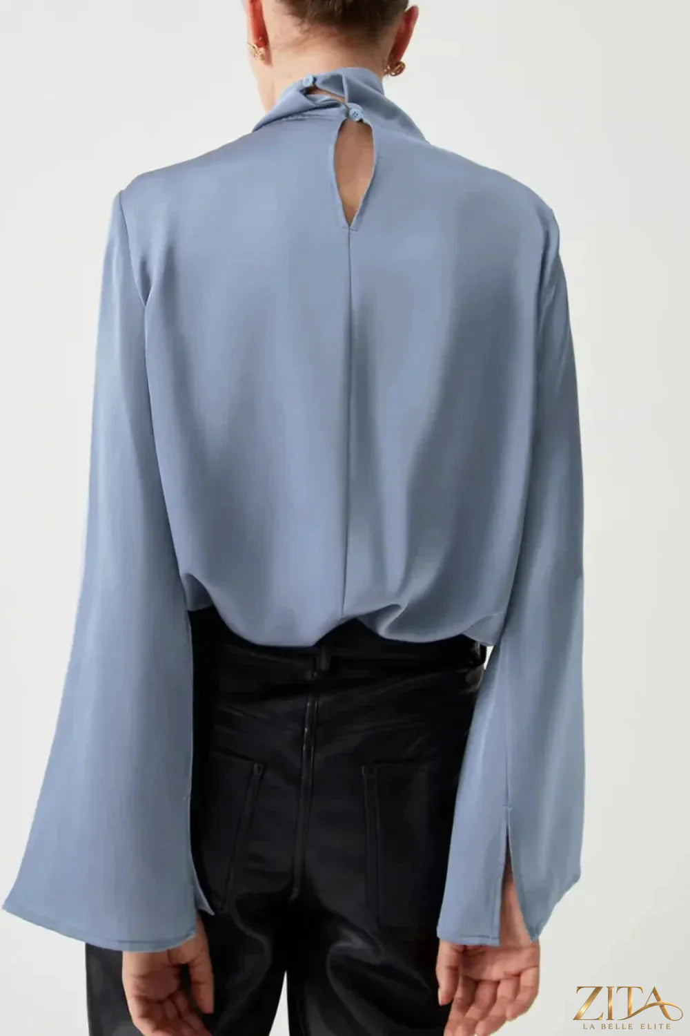 Zita La Belle Elite cutout turtleneck long sleeve blouse in black, featuring a stylish neckline and fitted design.