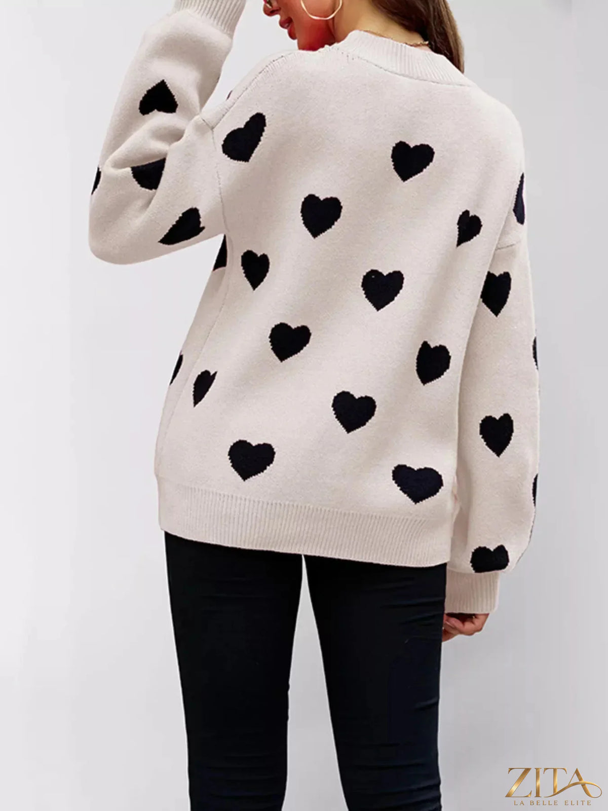 Heart-patterned dropped shoulder sweater by Zita La Belle Elite, featuring soft knit fabric and relaxed fit with romantic heart designs.