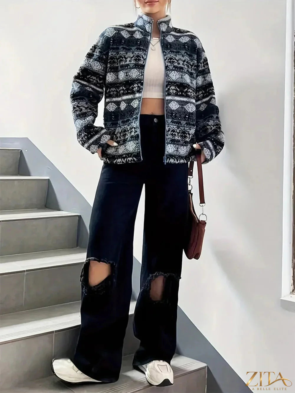 Zita La Belle Elite geometric turtleneck zip-up jacket with bold pattern, fitted style, and modern design.
