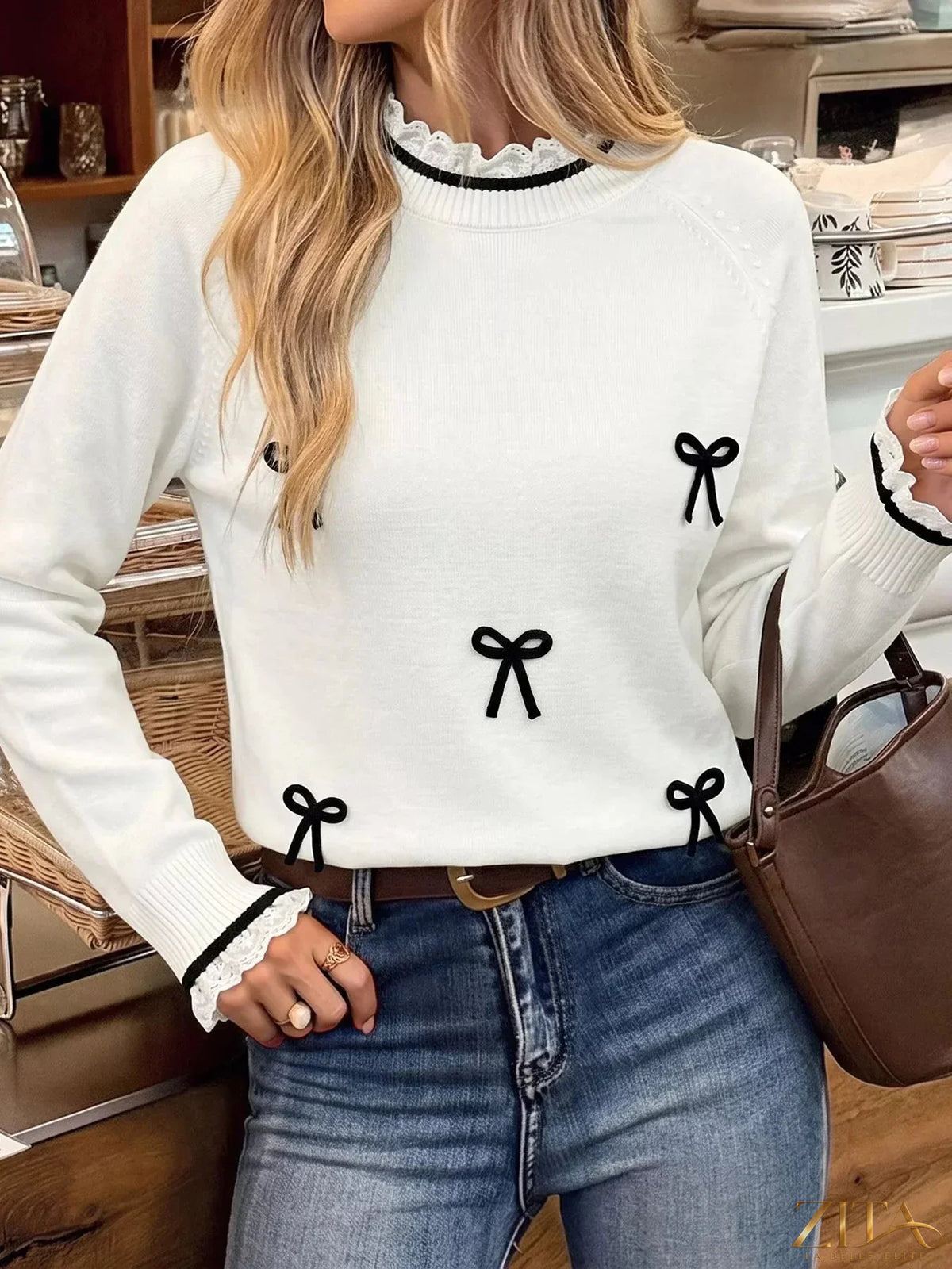 Zita La Belle Elite lace trim sweater with bow embellishments, featuring delicate lace details and a stylish, cozy fit.