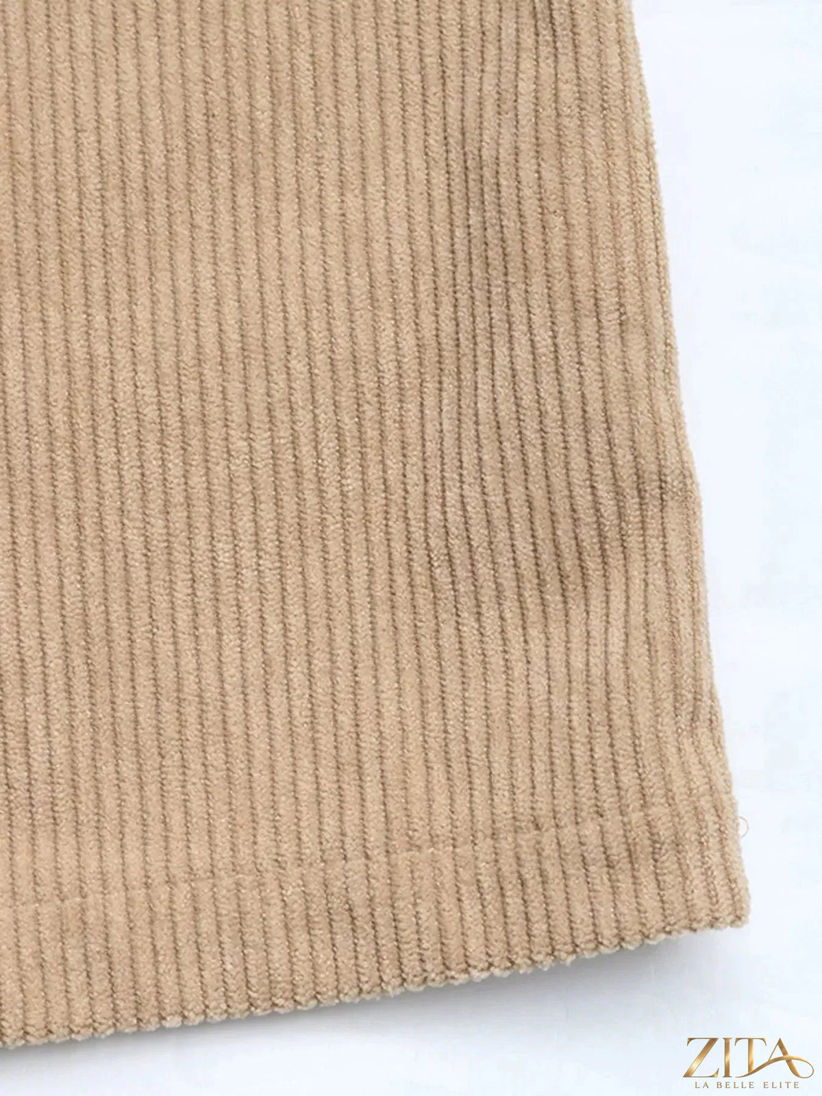 Casual corduroy overall dress by Zita La Belle Elite, featuring a relaxed fit with adjustable straps and front pockets.