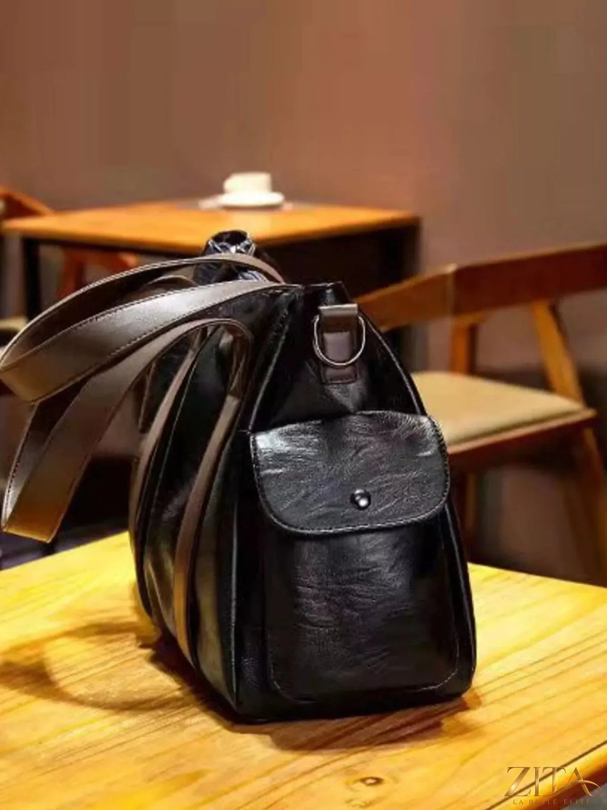 Trendsi PU leather handbag with sleek design, top handle, and spacious interior, perfect for stylish everyday use.