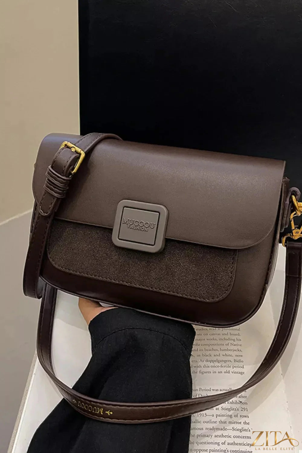 Zita La Belle Elite flap closure shoulder bag with elegant design, featuring a sleek leather finish and adjustable strap.