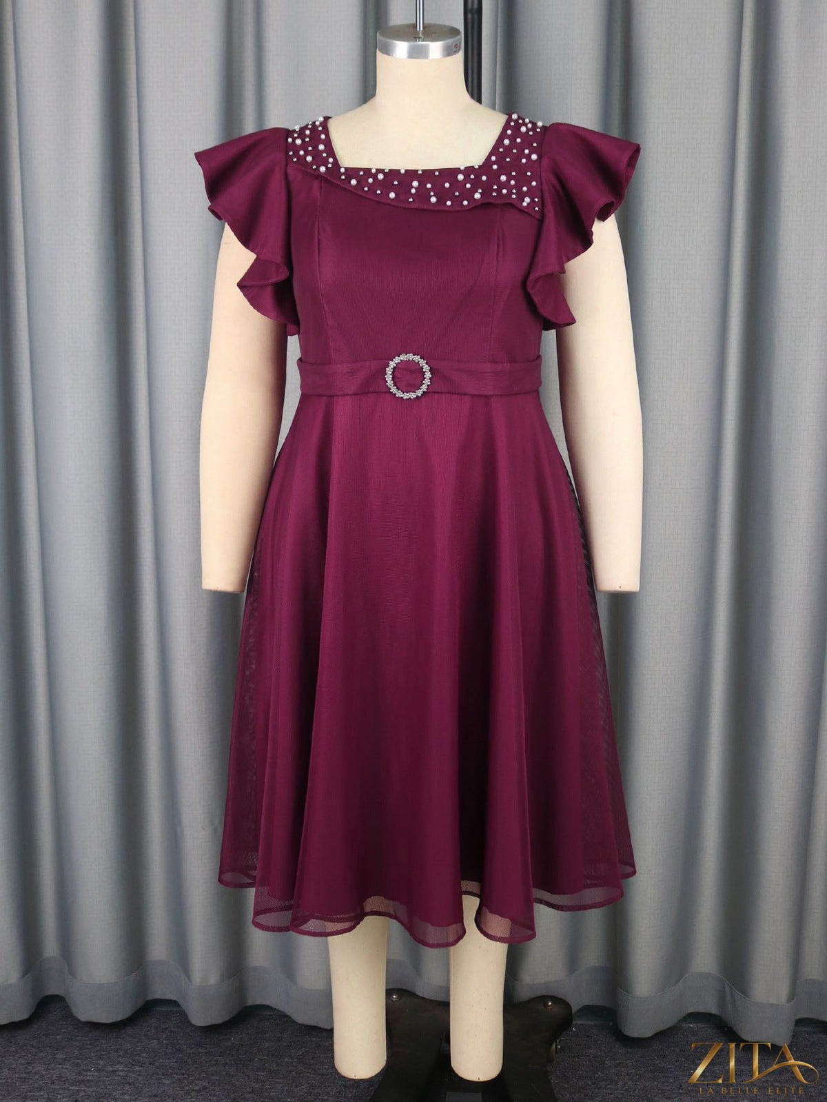 Elegant Zita La Belle Elite summer mesh dress with butterfly sleeves, ruffles, and a flowy design for wedding or party guests.