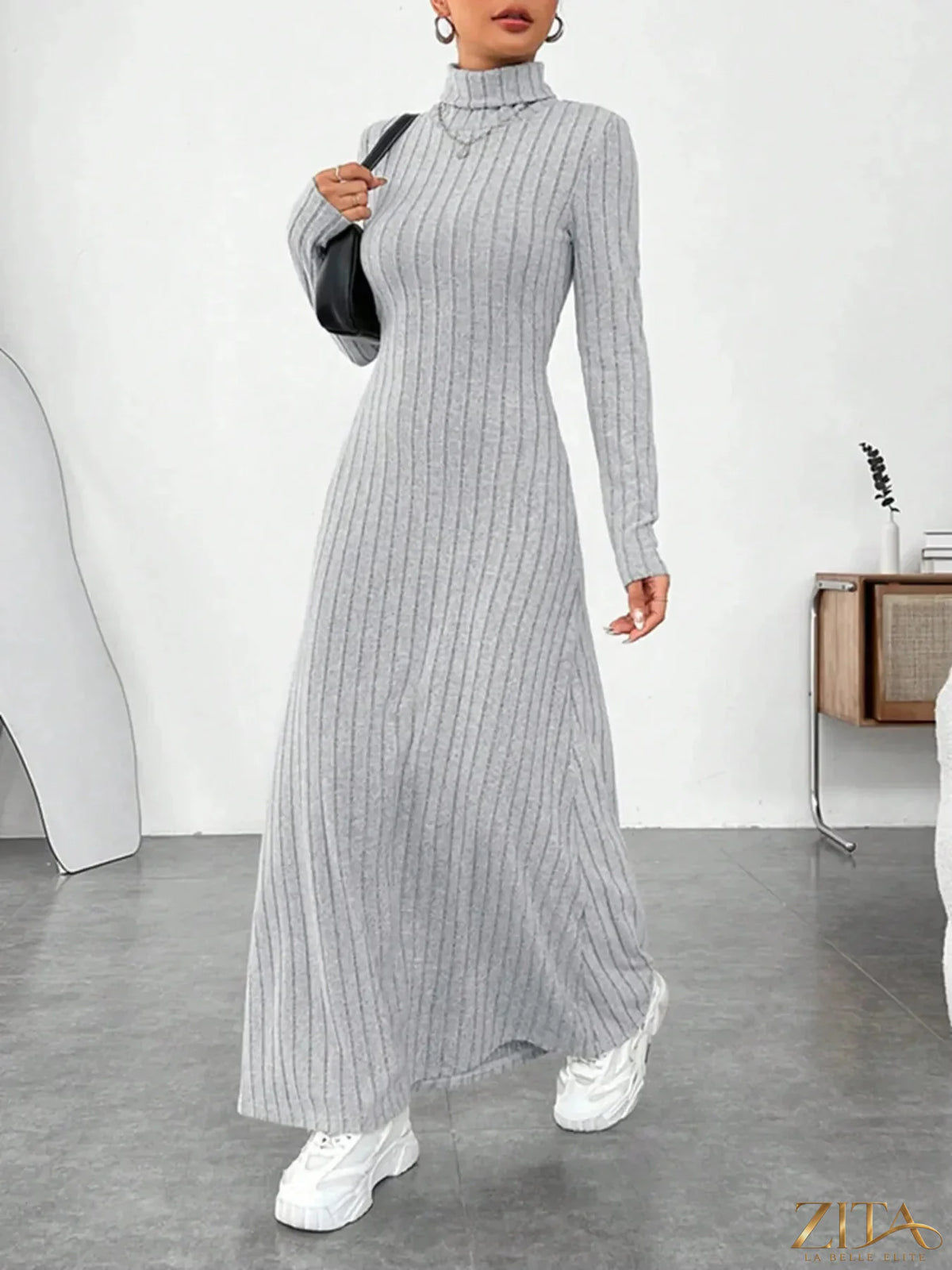 Ribbed turtleneck long sleeve maxi knit dress by Trendsi, featuring a fitted silhouette and textured ribbed fabric in a cozy style.