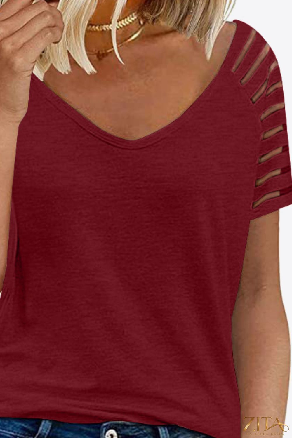 V-neck raglan sleeve tee by Trendsi, featuring a casual fit with contrasting sleeve colors and a comfortable, stylish design.