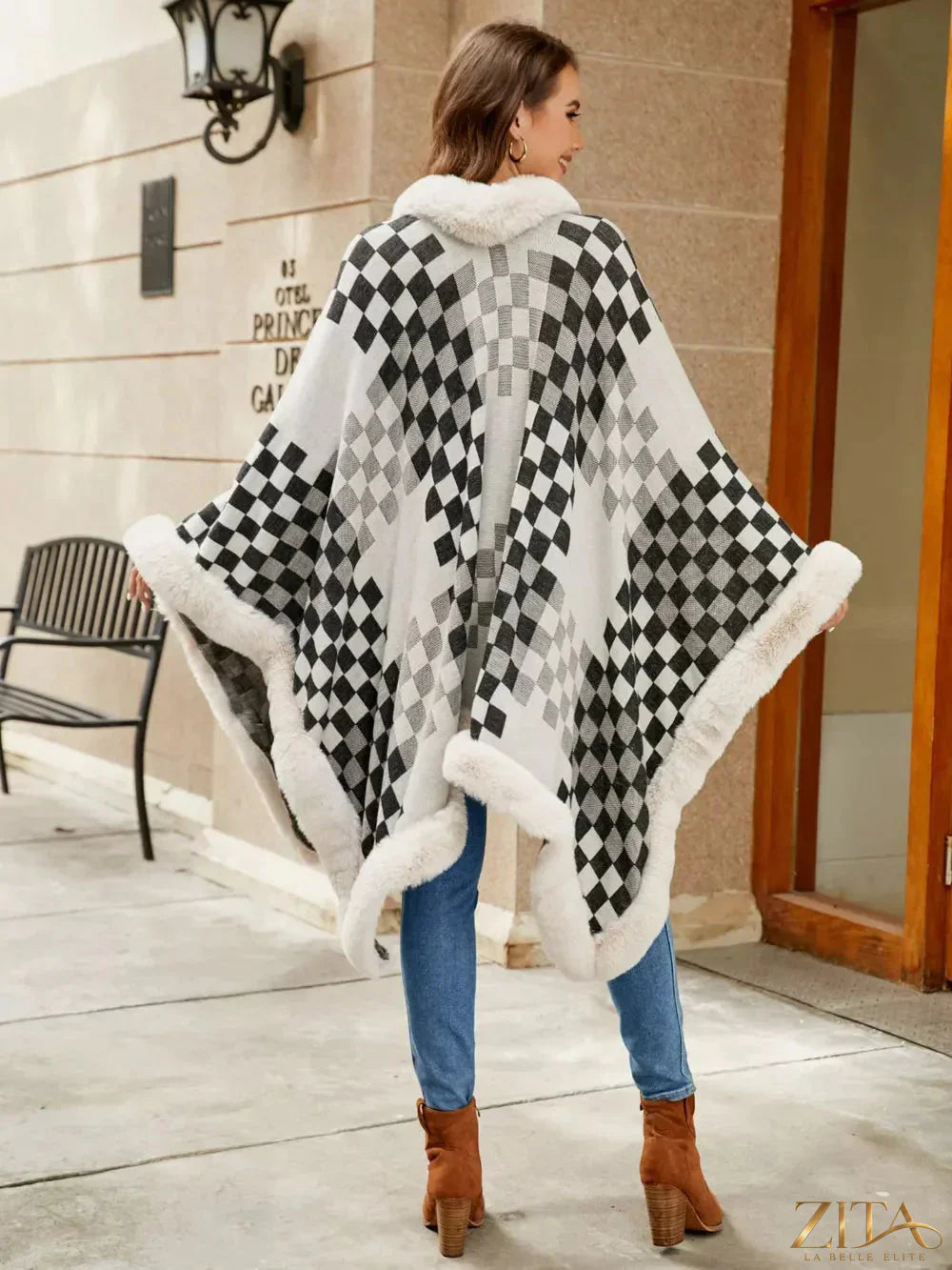 Checkered faux fur trim poncho by Zita La Belle Elite, featuring a stylish checkered pattern and cozy fur accents.