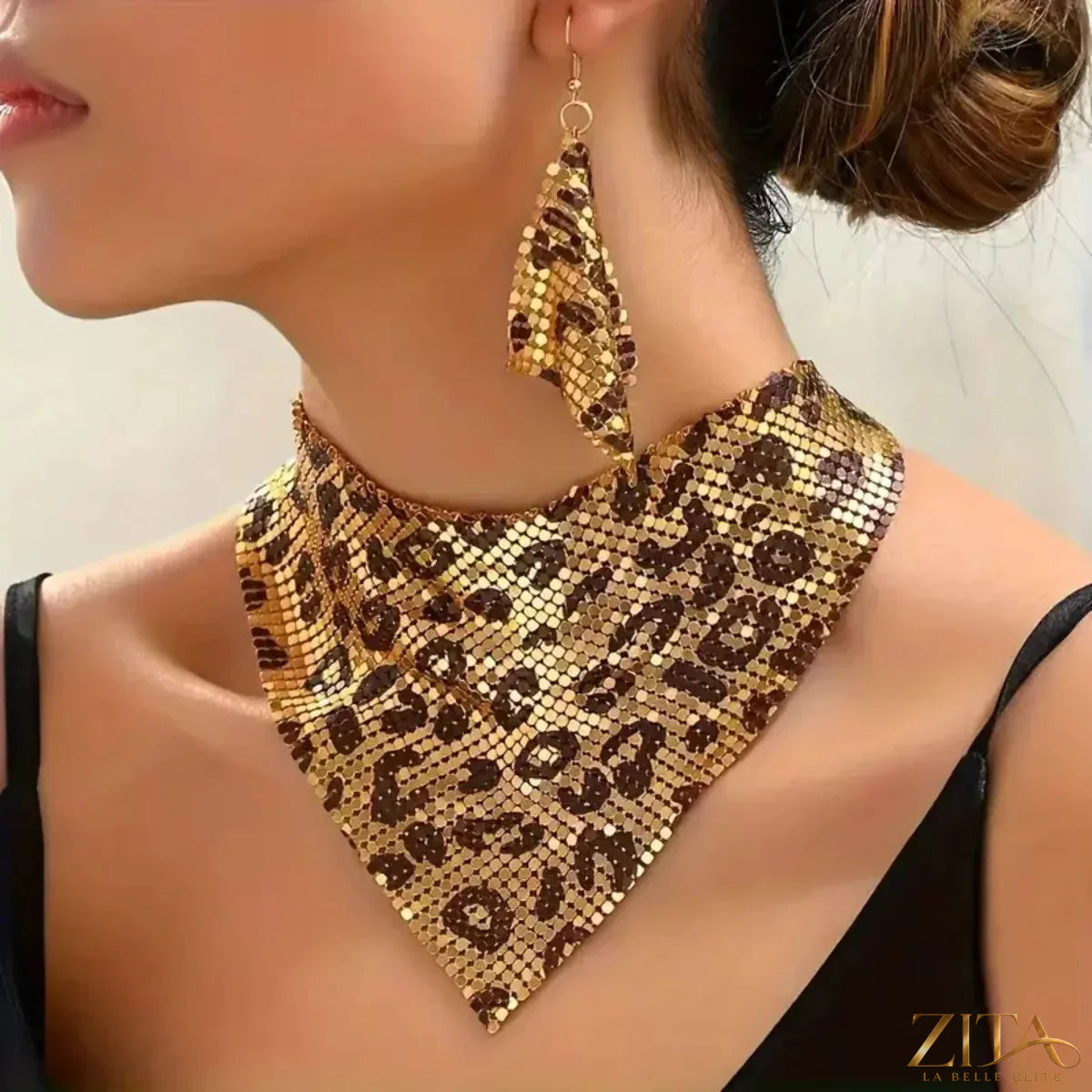 Leopard jewelry set featuring a necklace and matching earrings from Trendsi with leopard print design on a white background.