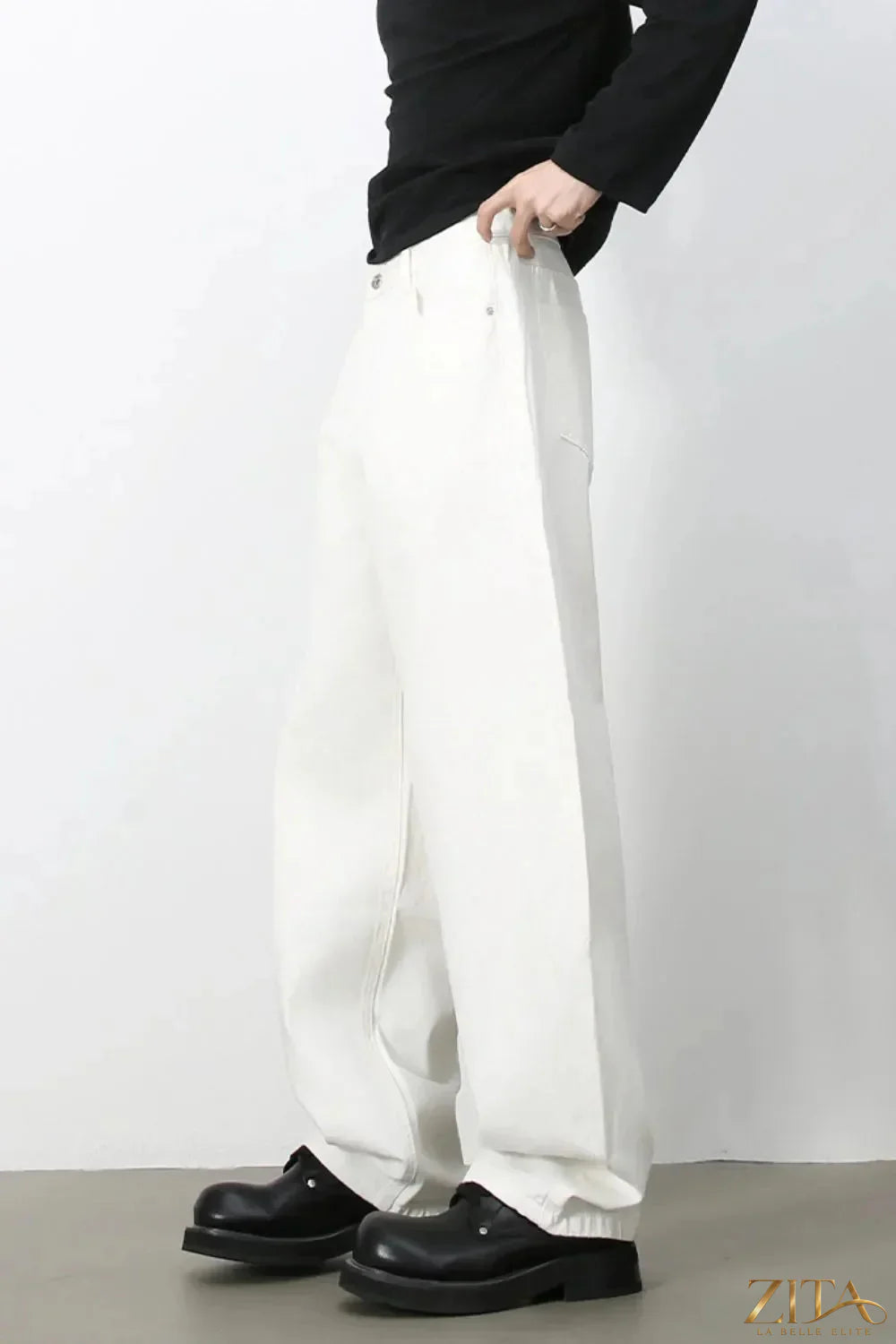 Men's high rise wide leg jeans by Zita La Belle Elite, featuring a relaxed fit and classic denim look.