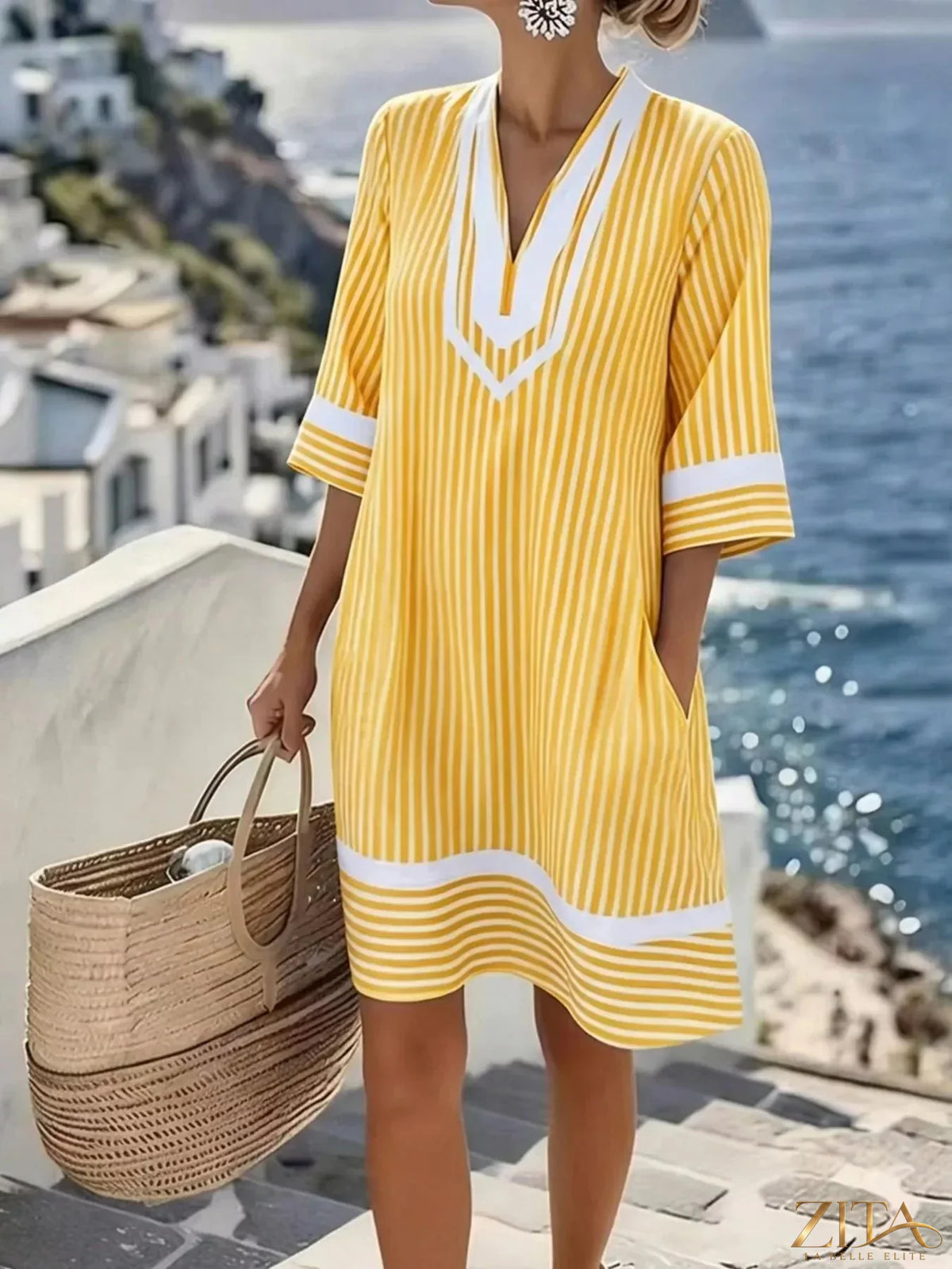 Plus size striped V-neck casual dress by Zita La Belle Elite, featuring a relaxed fit and vibrant color pattern.
