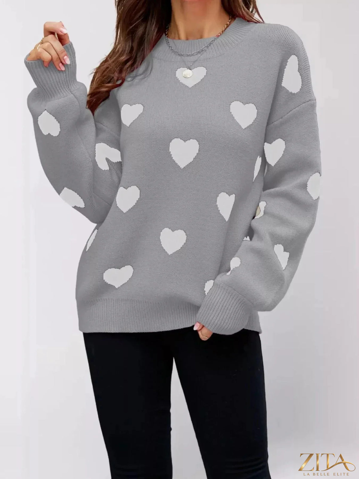 Heart-patterned dropped shoulder sweater by Zita La Belle Elite, featuring a cozy knit with romantic heart design.