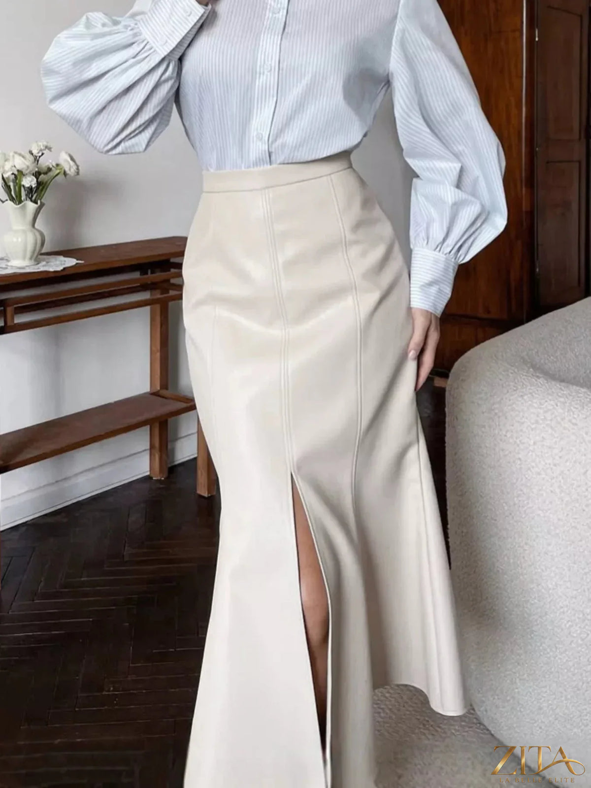 Zita La Belle Elite slit mermaid midi skirt in sleek fabric, showcasing a fitted design with a stylish slit detail.