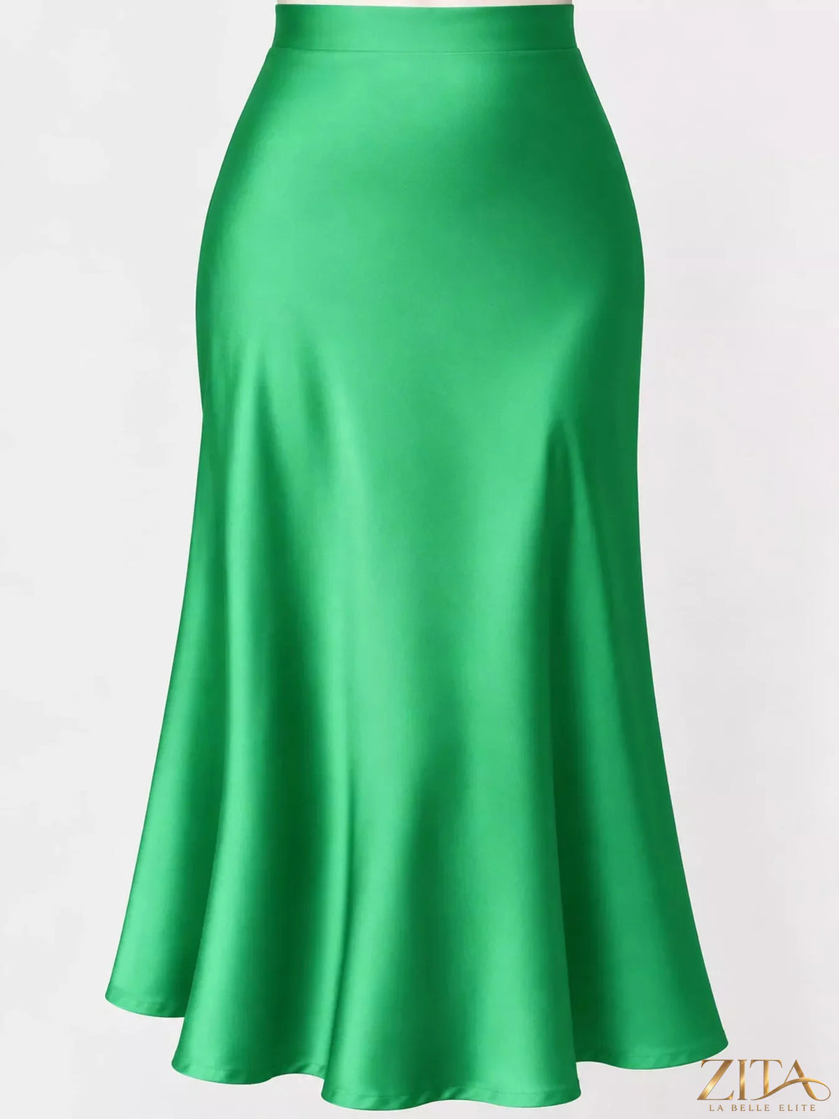 High-waisted satin midi skirt by Trendsi, flowing fabric with a sleek design, shown on a model in a stylish setting.