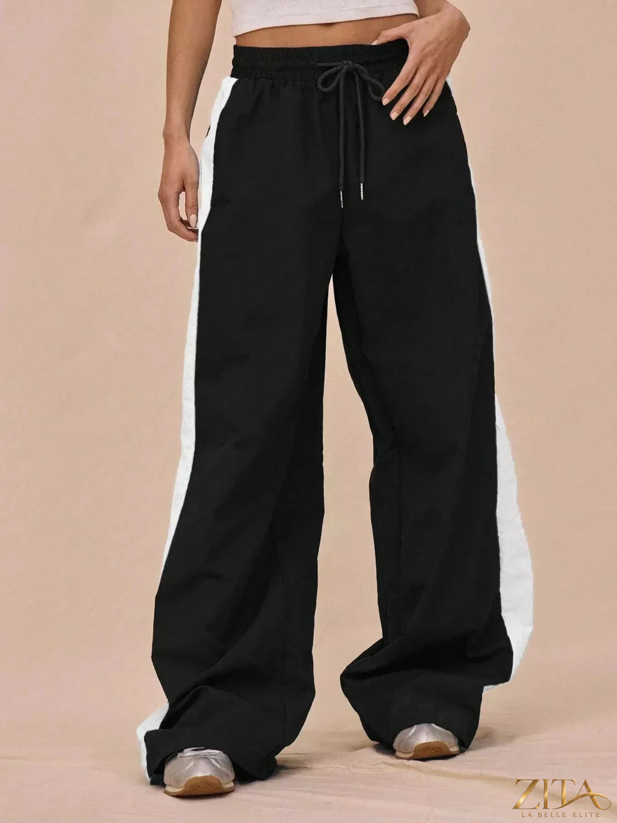 Zita La Belle Elite color-block tracksuit with matching wide-leg pants, featuring vibrant contrasting panels and casual fit.