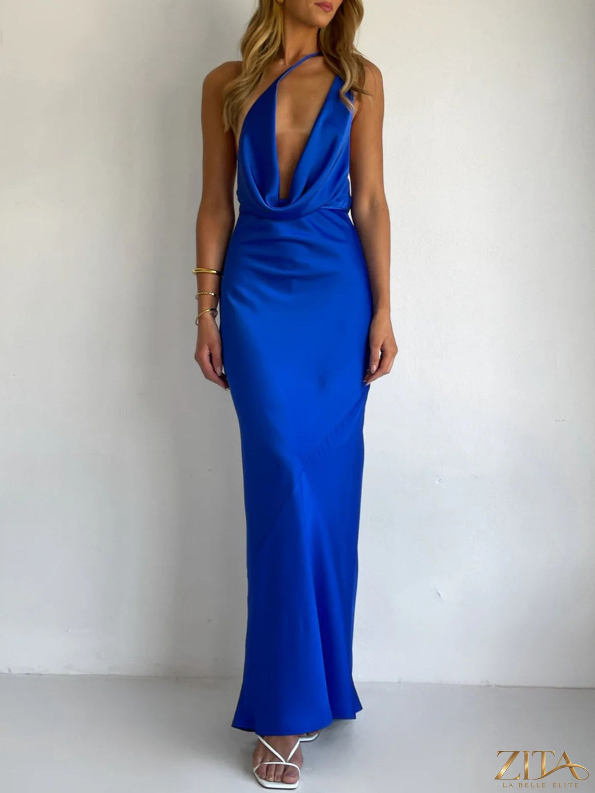 Zita La Belle Elite halter neck satin maxi dress displayed on a hanger with flowing fabric and elegant design.