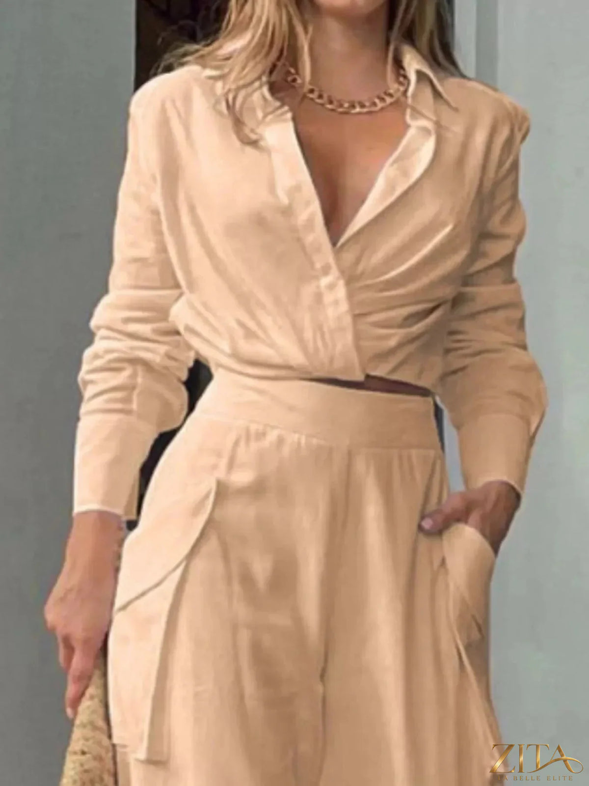 Zita La Belle Elite long sleeve shirt and wide leg pants set in neutral tones, shown on a model with a relaxed fit and stylish design.