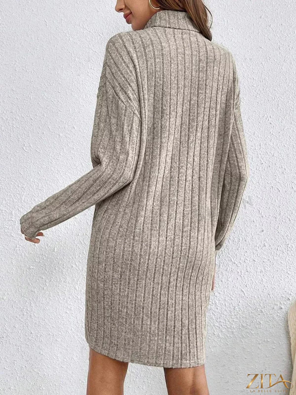 Zita La Belle Elite ribbed knit turtleneck dress, close-up showcasing fitted silhouette and textured fabric in natural studio lighting.