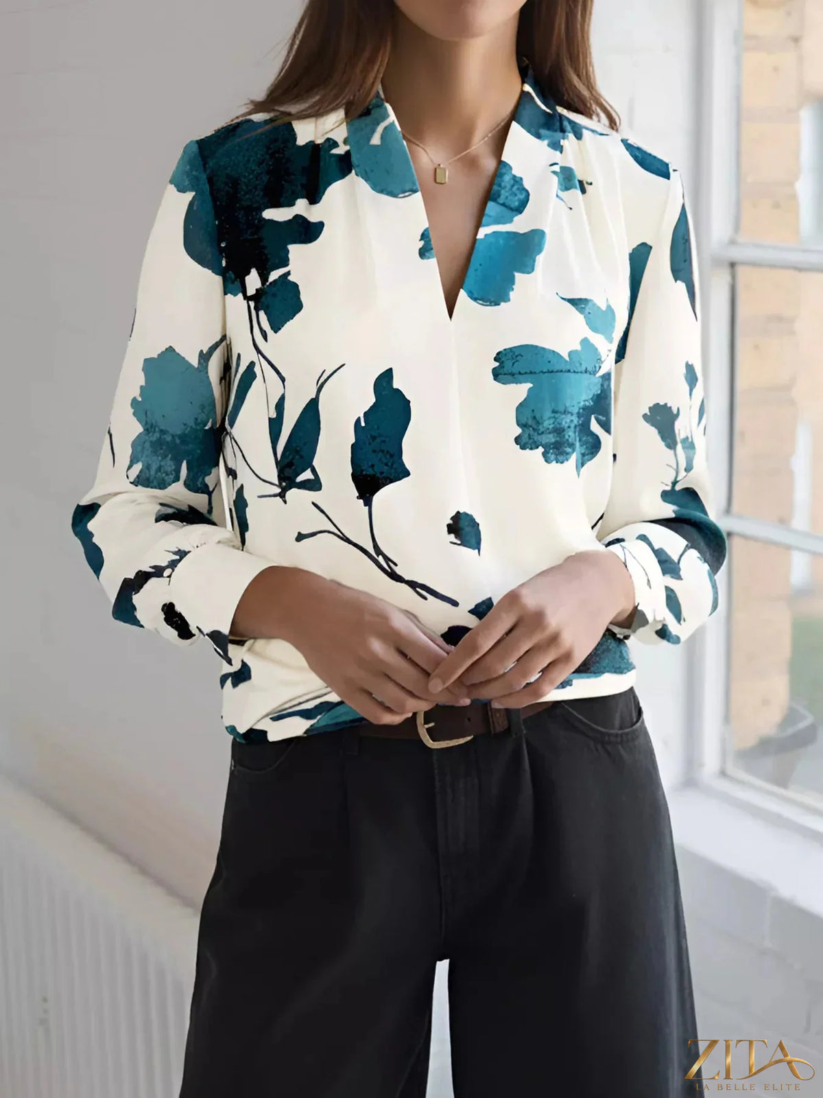 Printed V-neck long sleeve blouse by Zita La Belle Elite, featuring a stylish pattern and relaxed fit.