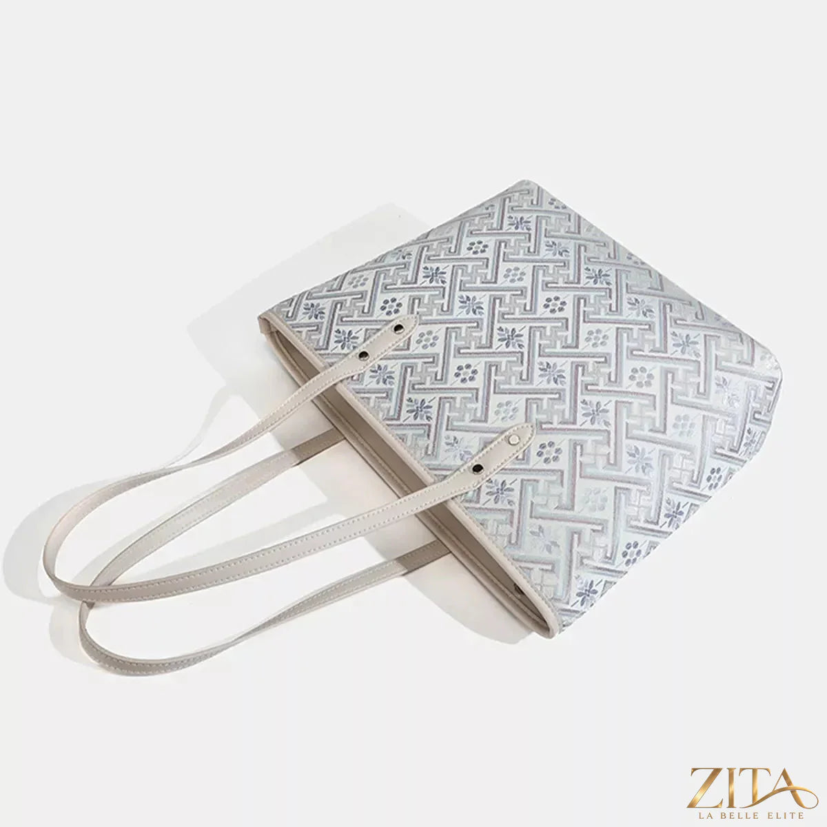 Zita La Belle Elite geometric pattern tote bag with bold black and white design, spacious fabric, and sturdy handles.