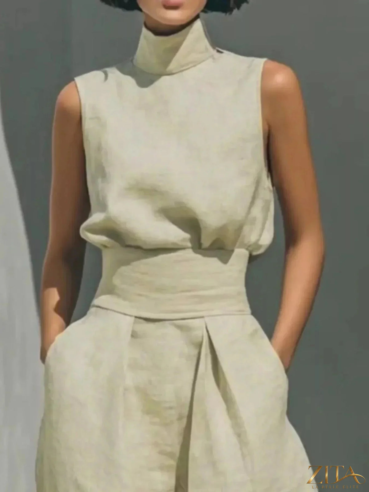 Plus size Zita La Belle Elite sleeveless turtleneck top and wide-leg pants set, shown in a full-length view.