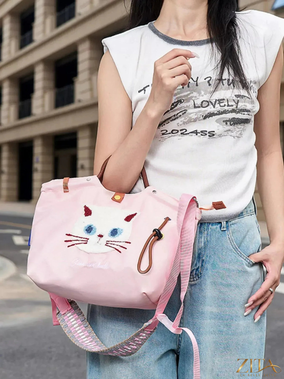 Zita La Belle Elite embroidered cat tote bag with adjustable shoulder strap, showcasing detailed cat embroidery and durable fabric.