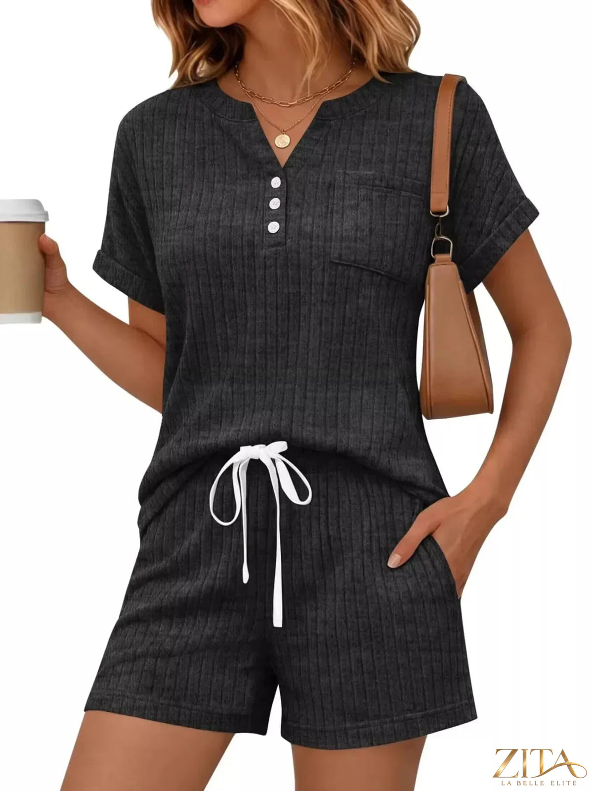Casual ribbed knit tee and shorts set by Trendsi, featuring a comfortable, stylish matching top and bottom for everyday wear.