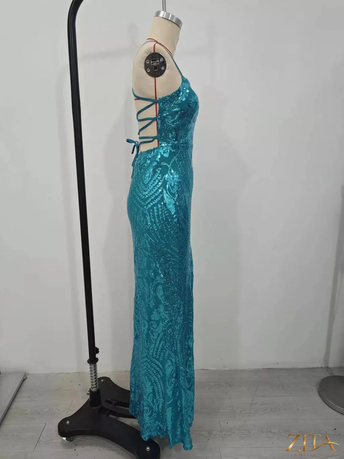 Sequin embellished black bodycon backless evening dress with lace-up back by Zita La Belle Elite, featuring a fitted silhouette and elegant design.