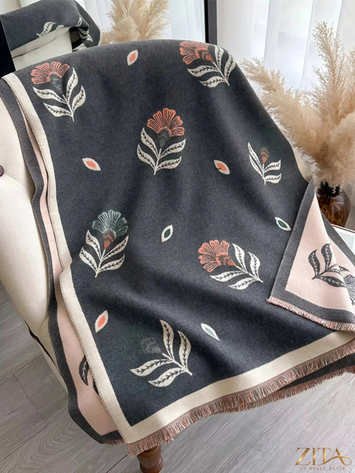 Printed raw hem shawl by Zita La Belle Elite featuring vibrant patterns and lightweight, breathable fabric.