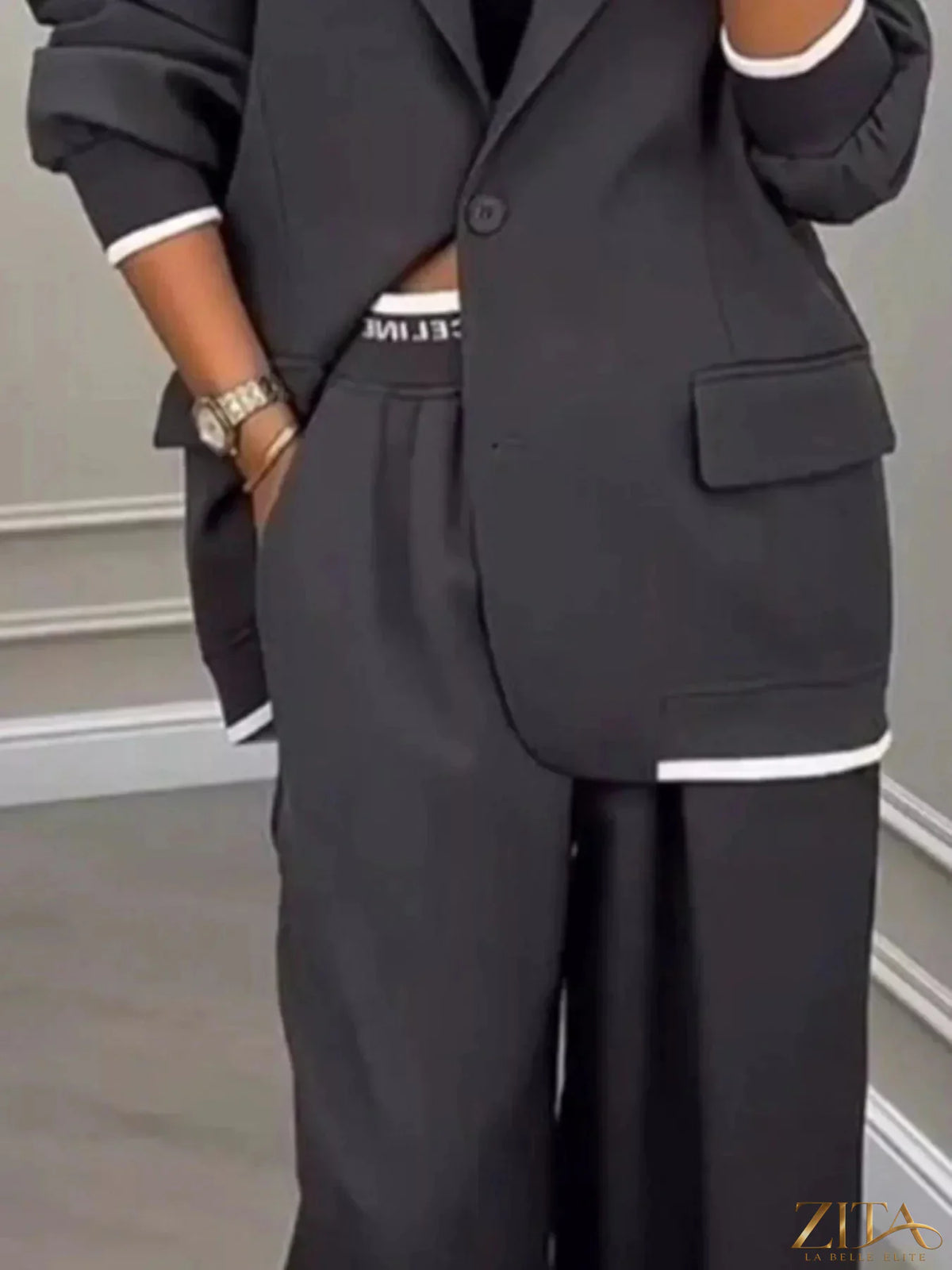 Plus size Zita La Belle Elite blazer and wide-leg pants set featuring a full-size one-button blazer and matching pants.