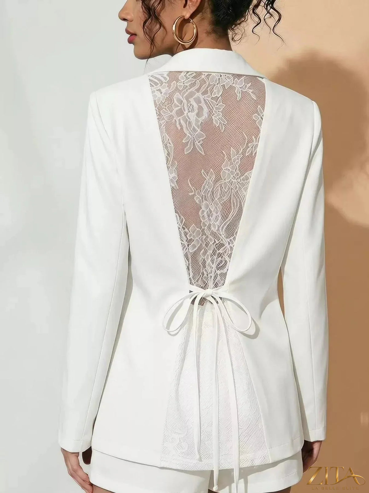 Zita La Belle Elite lace-back one-button blazer featuring a tailored fit and stylish design, displayed on a mannequin.