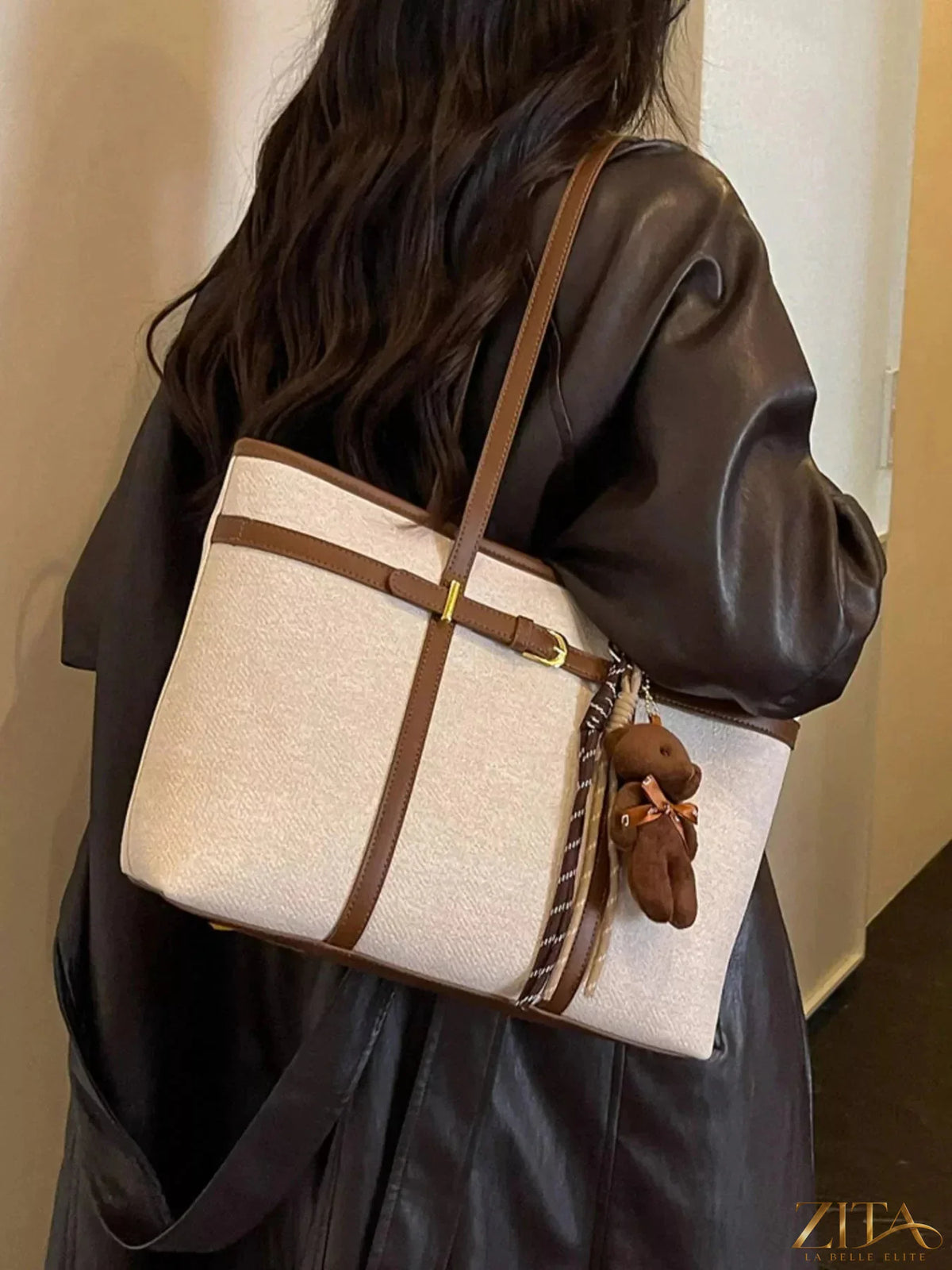 Zita La Belle Elite decorative buckle tote bag with stylish design and spacious interior, featuring a prominent decorative buckle on the front.