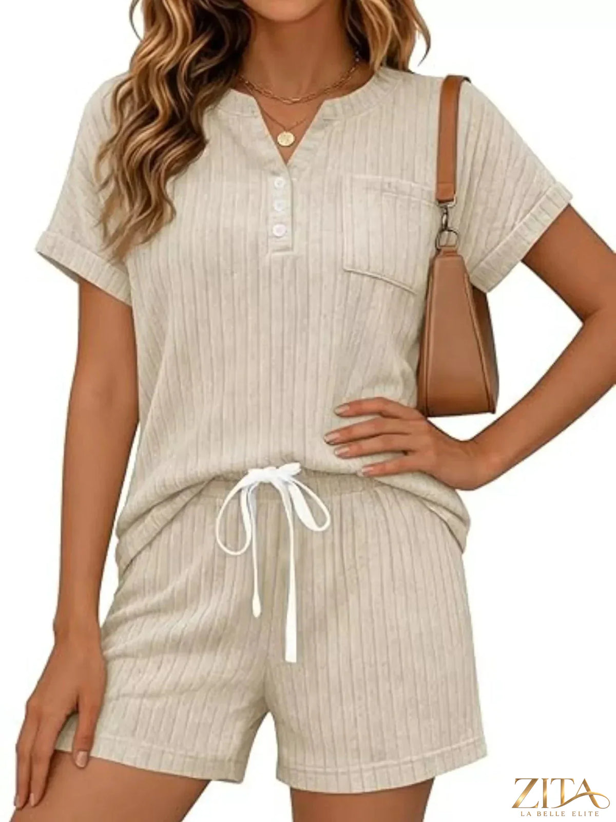 Casual ribbed knit tee and shorts set by Trendsi, featuring a comfortable, stylish matching top and bottom in neutral tones.