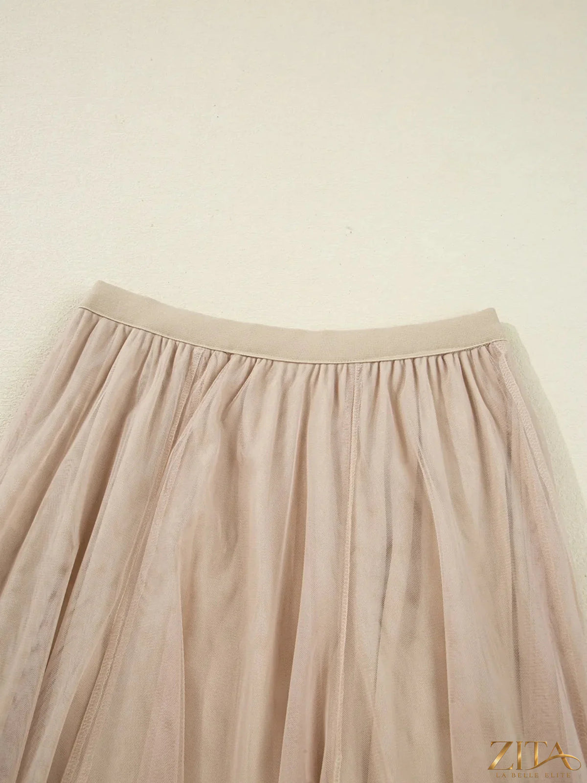 High-waisted midi skirt by Trendsi featuring a flowy fabric and classic design, perfect for versatile styling.