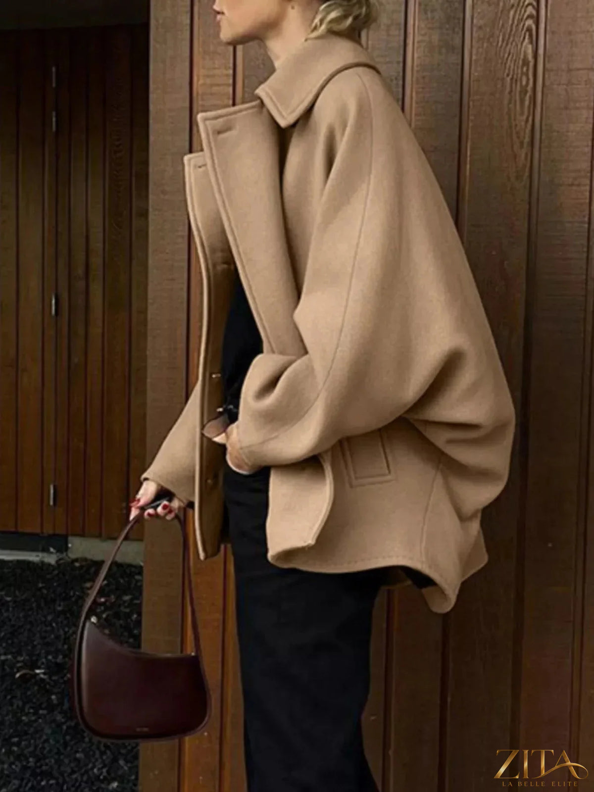 Zita La Belle Elite oversized lapel collar button-down coat in neutral fabric with large lapels and front buttons.