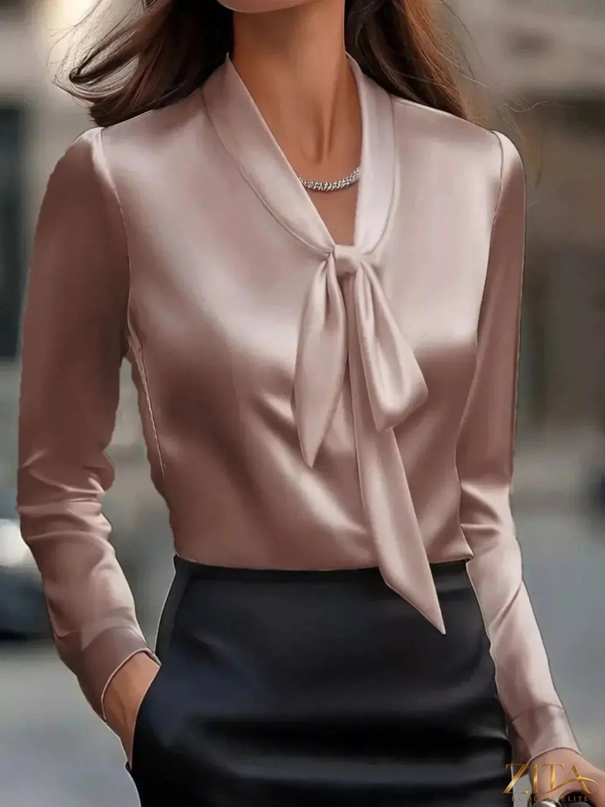 Zita La Belle Elite satin tie-front long sleeve blouse with a stylish collar and button details, elegant and smooth fabric.