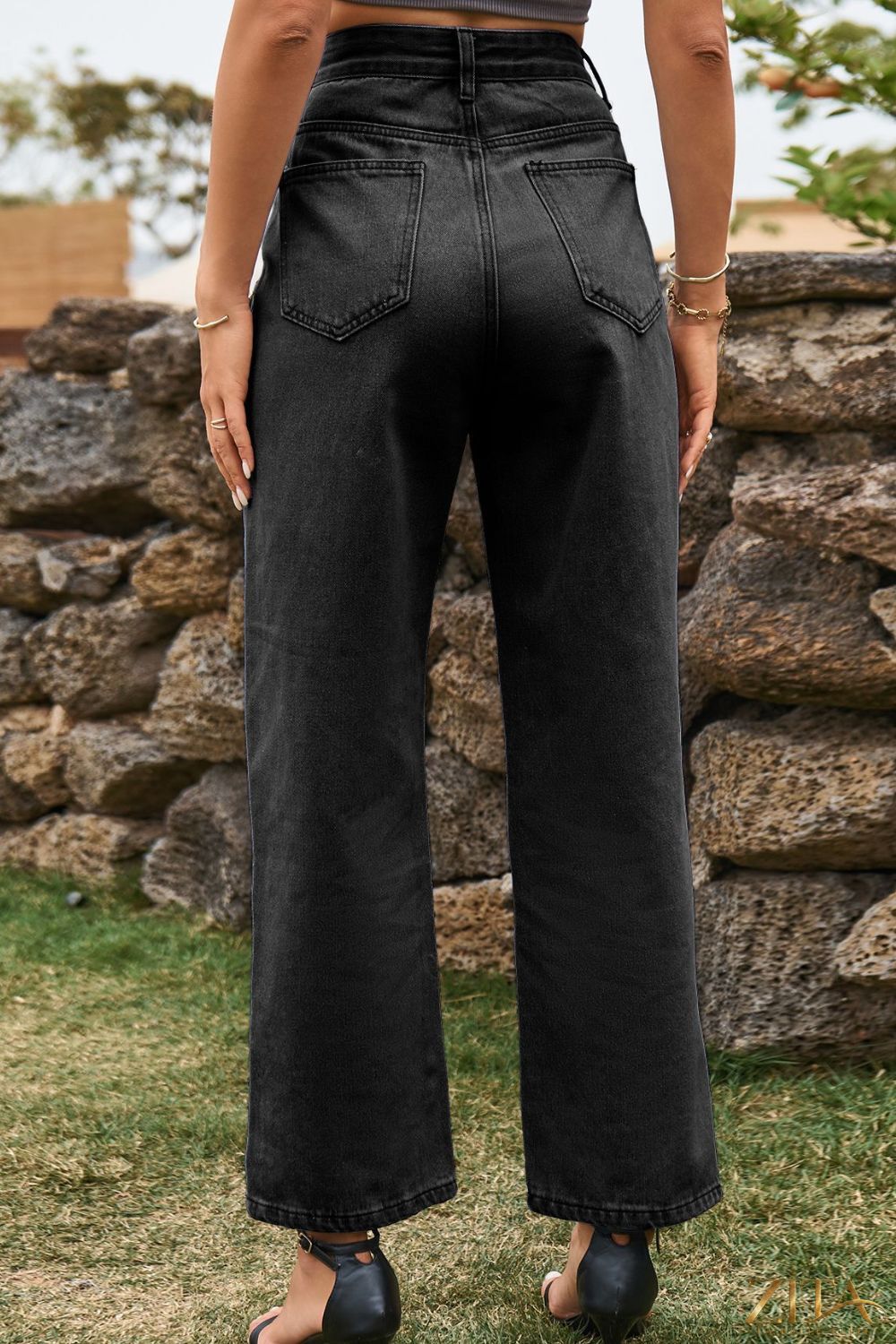 Zita La Belle Elite high waist loose fit ankle slit jeans shown on a model with casual styling and rolled cuffs.