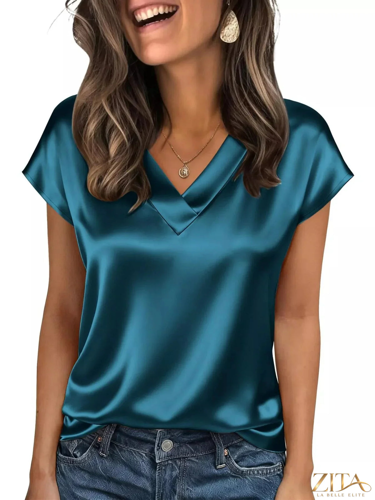 Zita La Belle Elite satin V-neck cap sleeve blouse with a smooth, shiny fabric and elegant fit, displayed on a model.