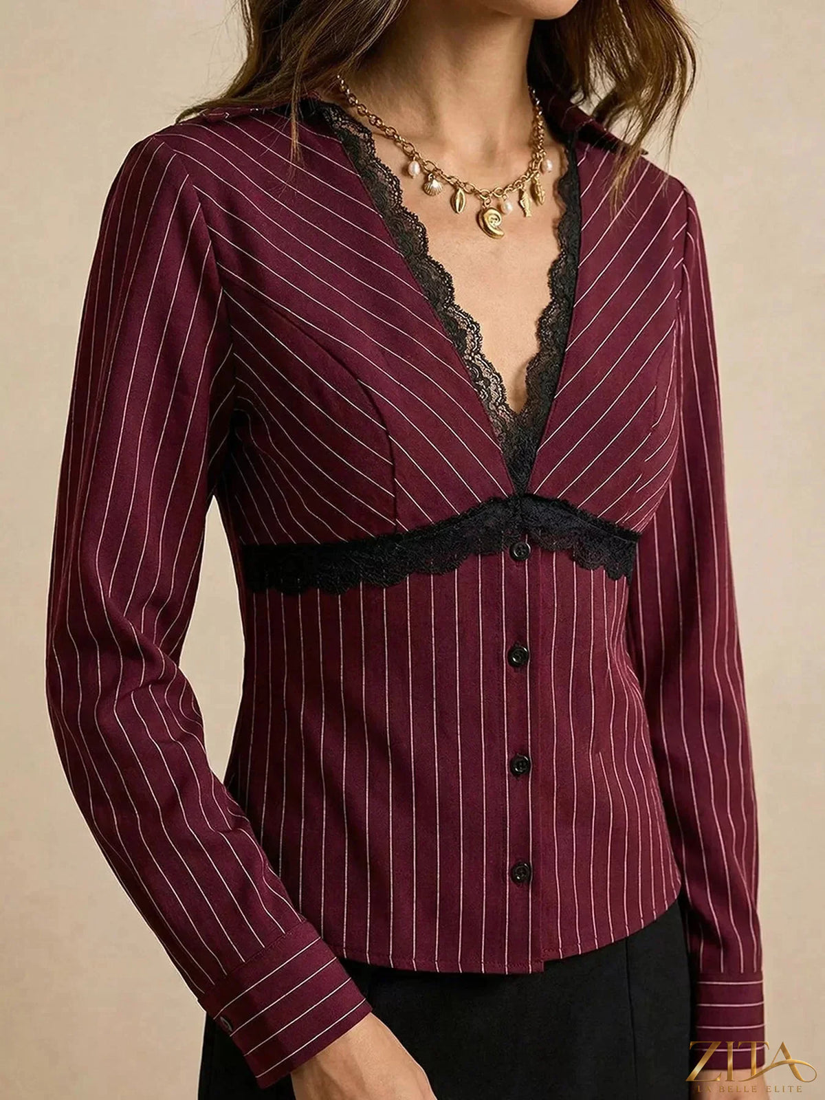 Zita La Belle Elite lace trim V-neck blouse featuring delicate lace detailing and a relaxed fit, shown on a neutral background.