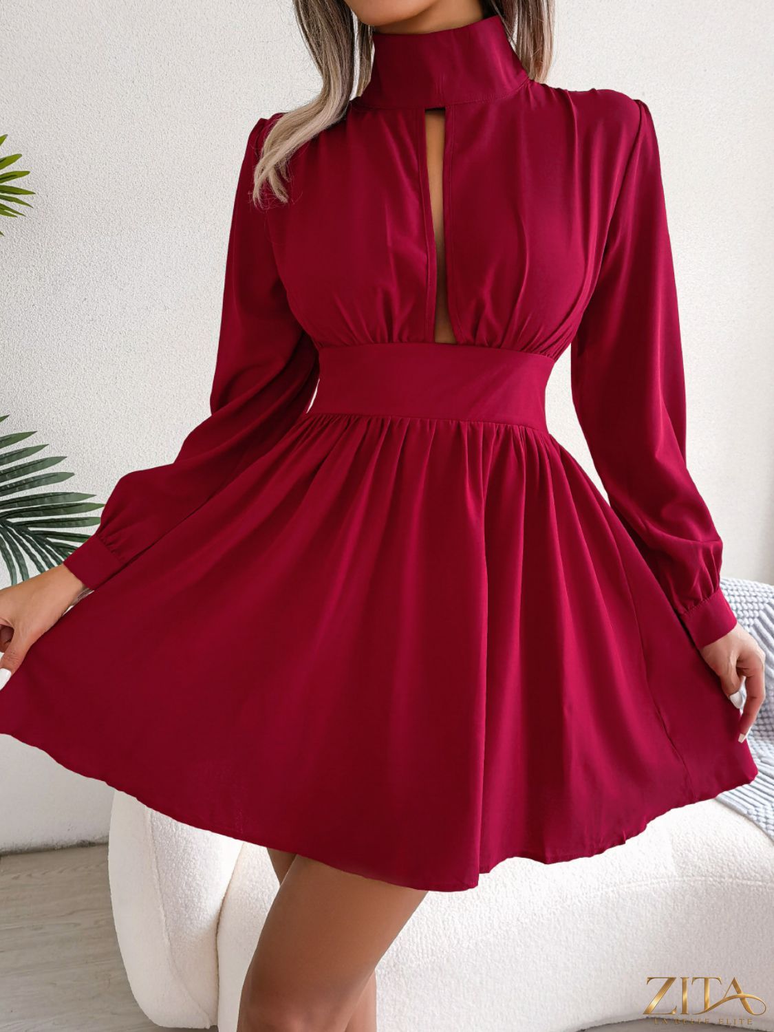 Black cutout turtleneck A-line mini dress by Trendsi, featuring a fitted silhouette and stylish design, shown on a model.