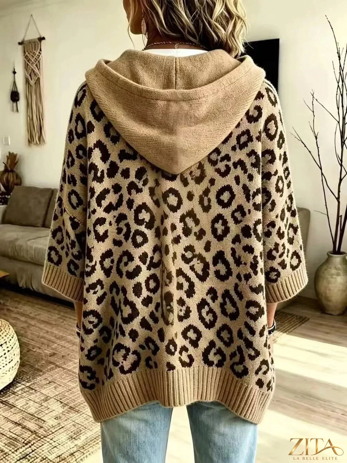 Zita La Belle Elite leopard print drawstring hooded sweater with front pocket and ribbed cuffs.