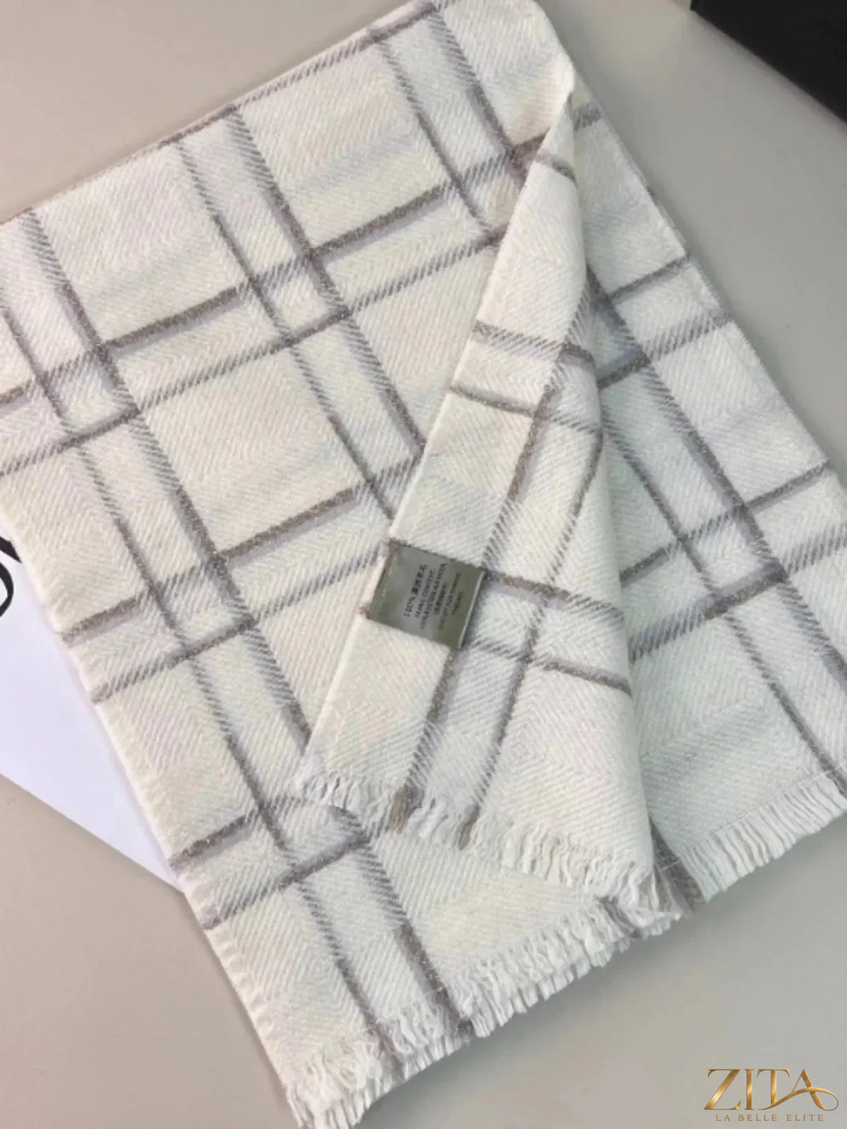 Zita La Belle Elite 100% wool raw hem plaid scarf with classic pattern and cozy texture, perfect for stylish winter wear.