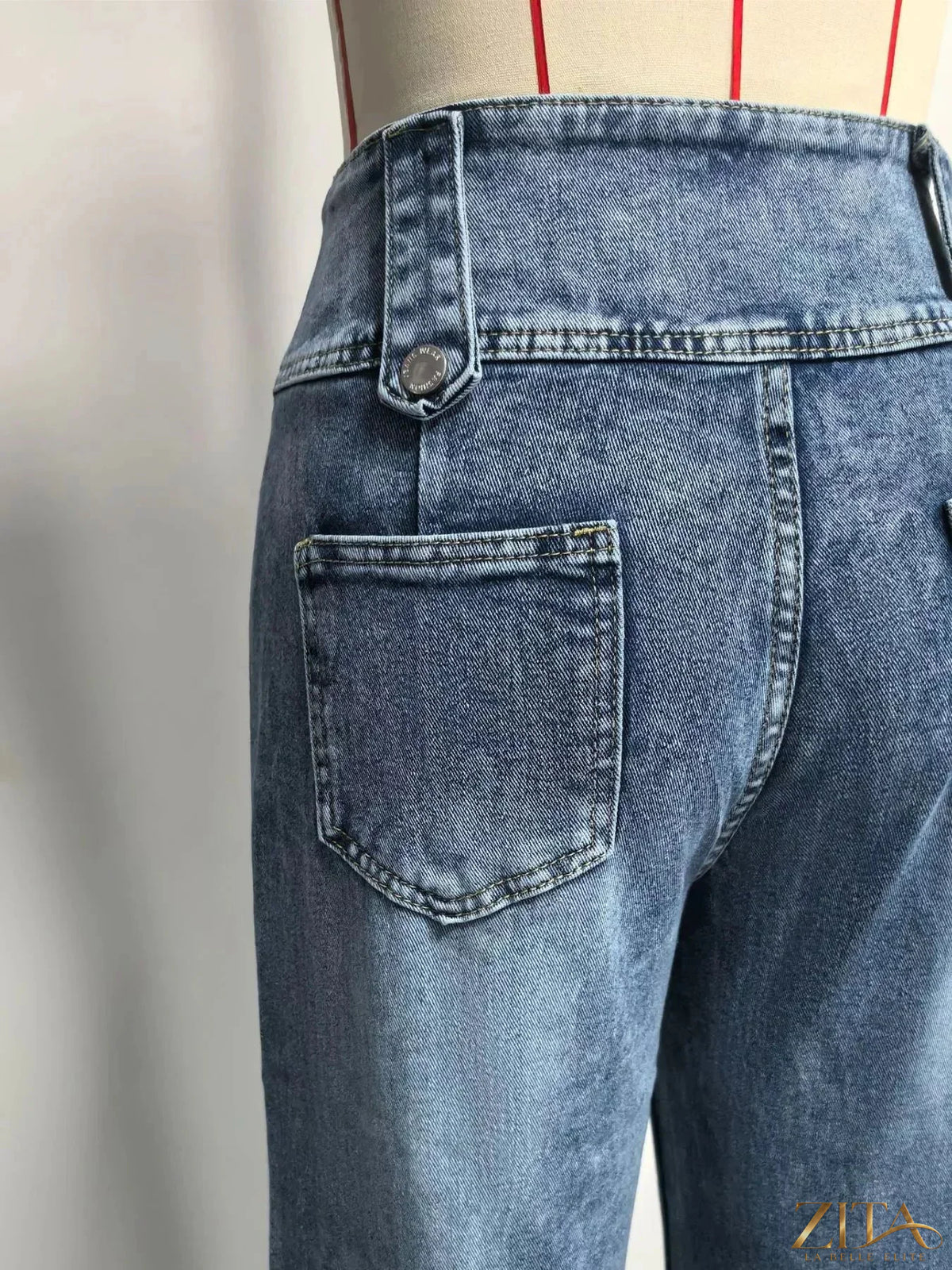 Zita La Belle Elite high waist wide-leg jeans with button decor, showcasing their stylish fit and denim fabric.