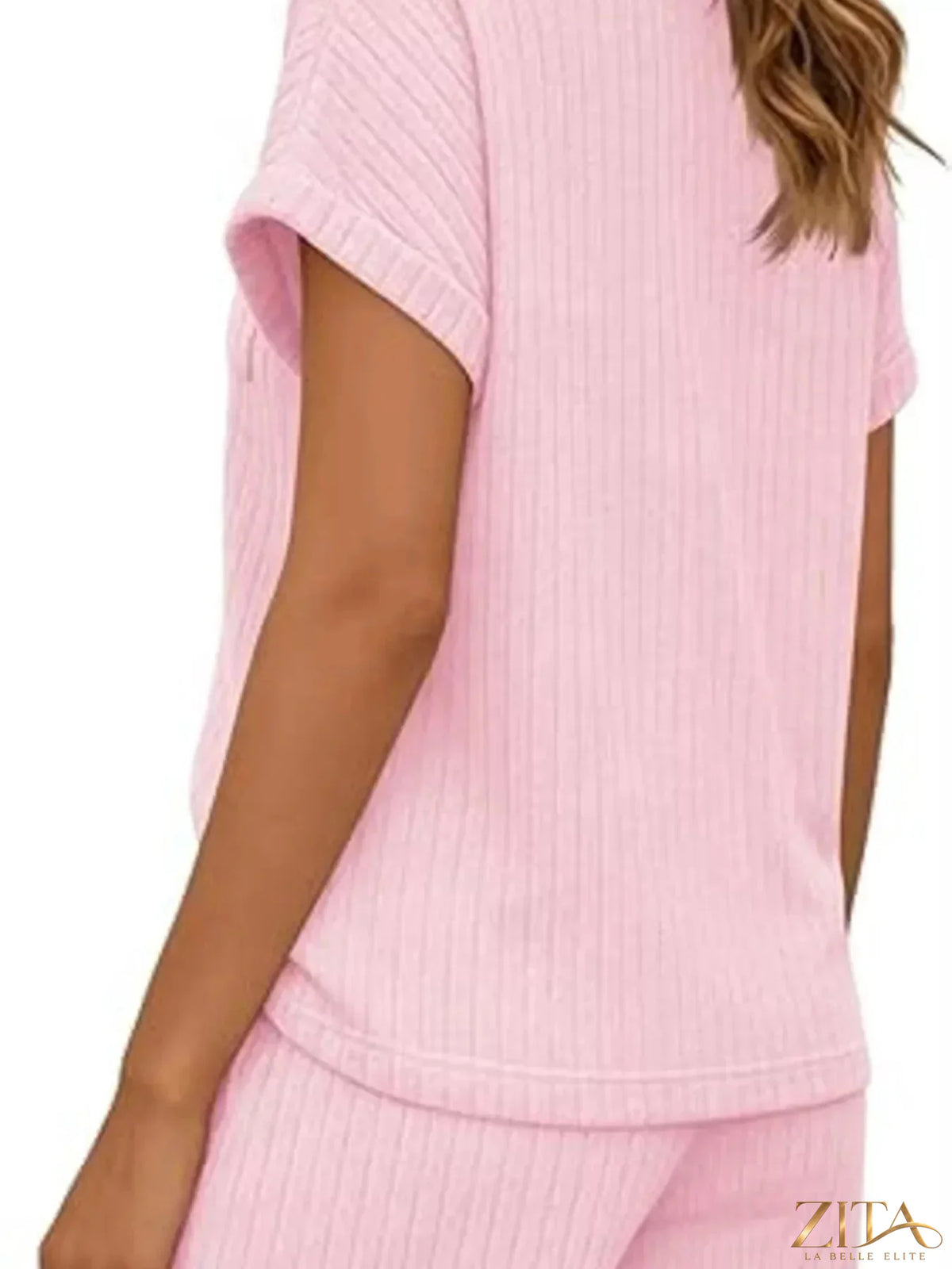 Casual ribbed knit tee and shorts set by Trendsi, featuring a comfortable, stylish matching top and bottom in neutral tones.