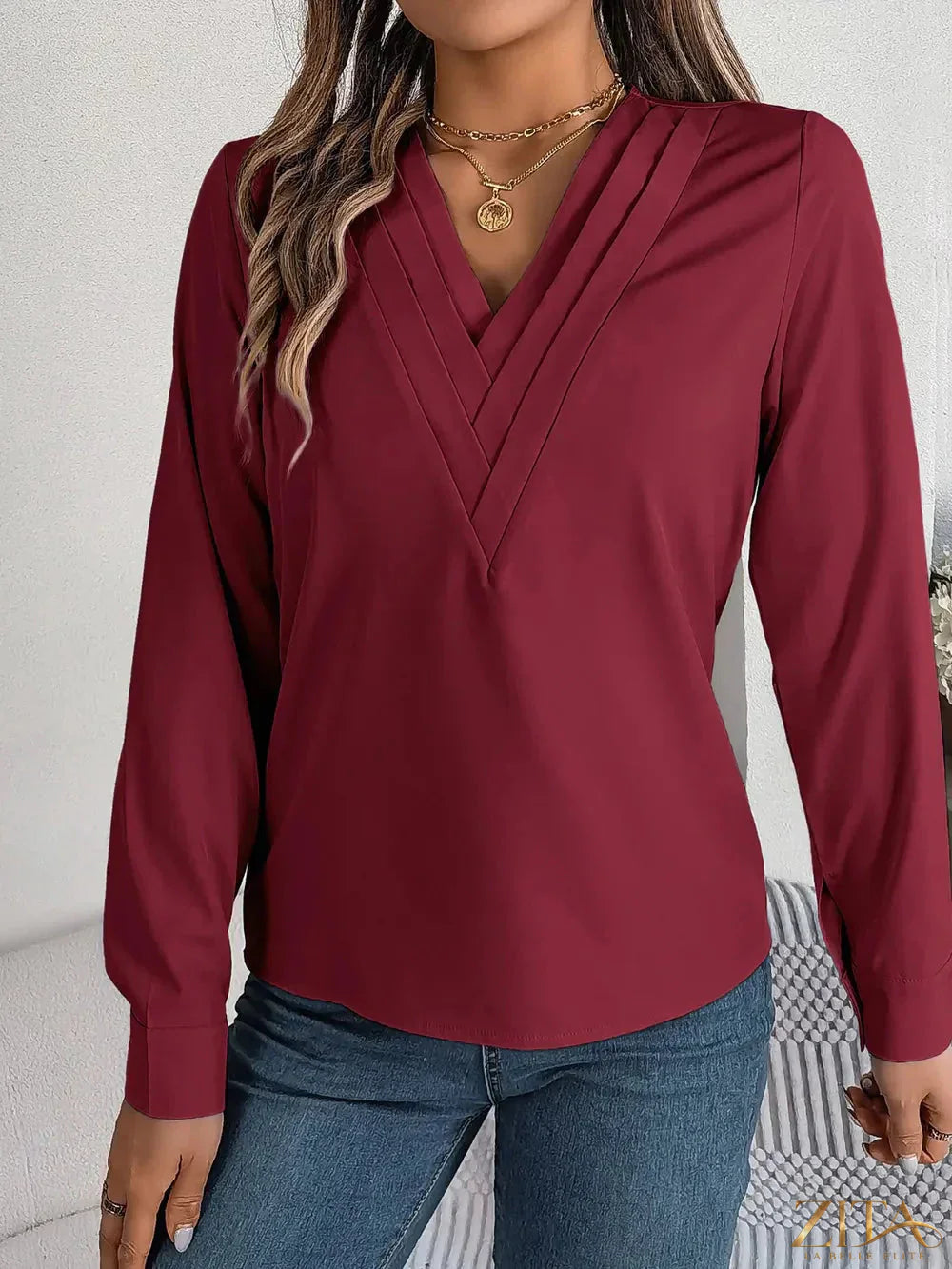 Zita La Belle Elite V-neck long sleeve blouse in soft fabric, featuring a relaxed fit and elegant design.