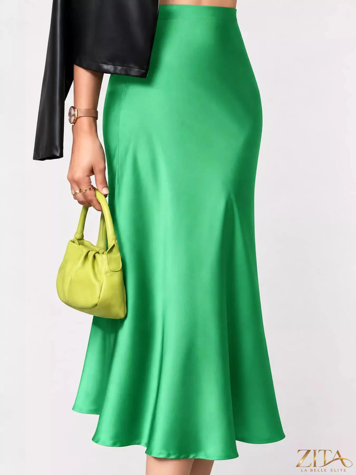 High-waisted satin midi skirt from Trendsi featuring a smooth, shiny fabric and a sleek, elegant silhouette.